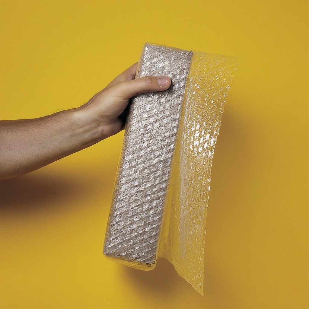 Clear bubble wrap held in a hand