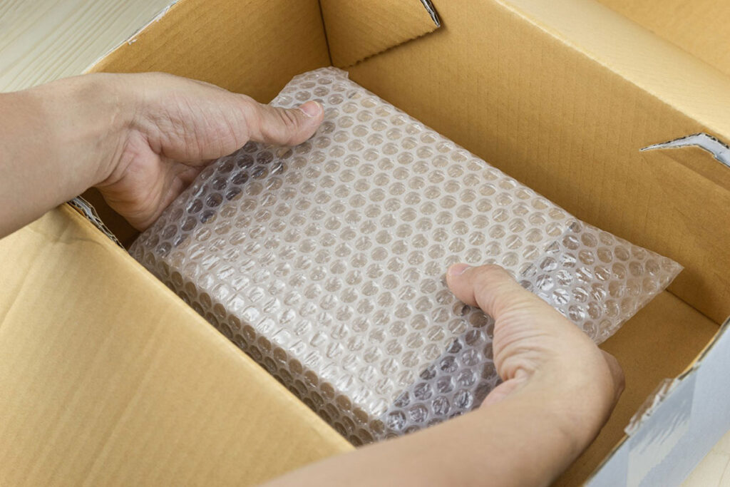 Item wrapped in bubble wrap inside a carton