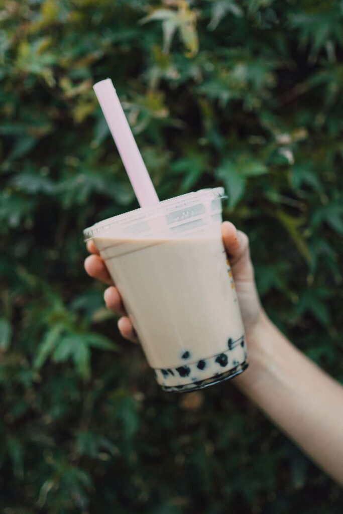 Boba milk tea in a clear plastic cup