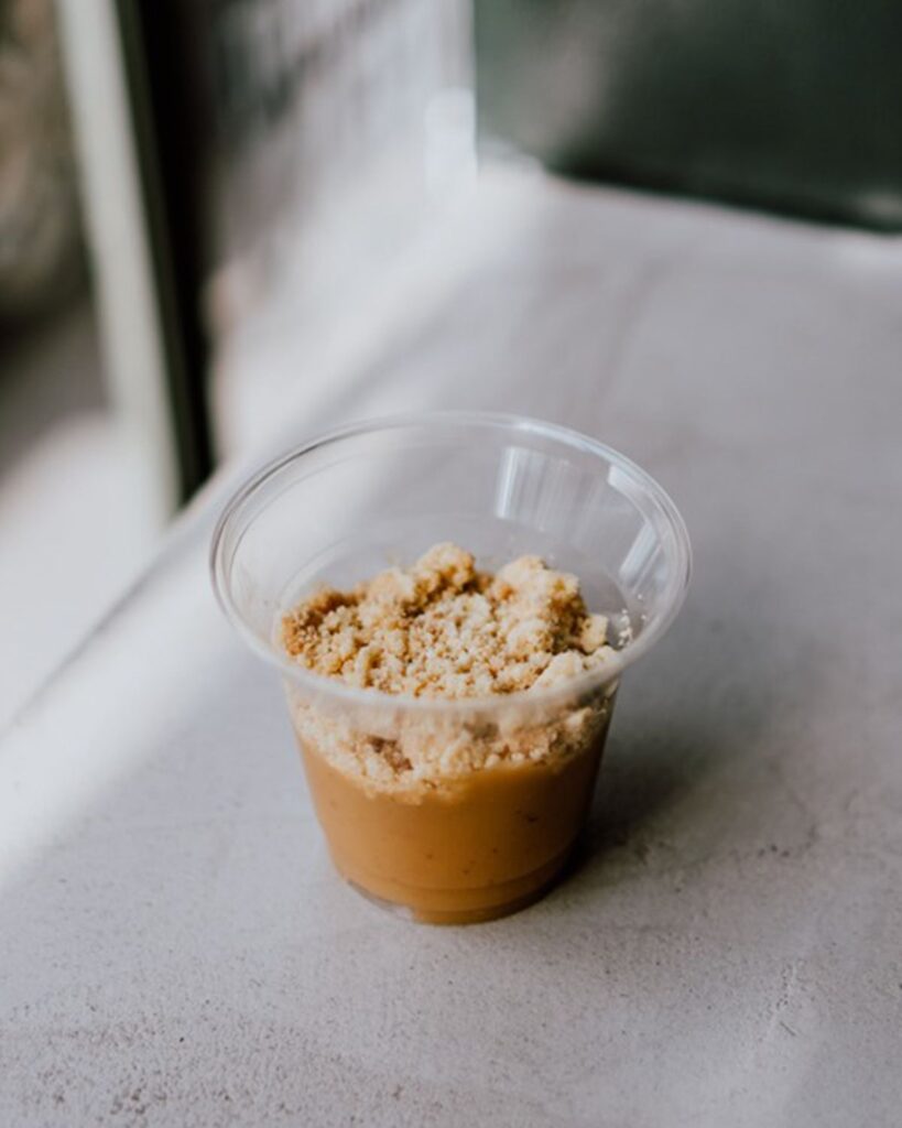 Dessert in a small clear plastic cup