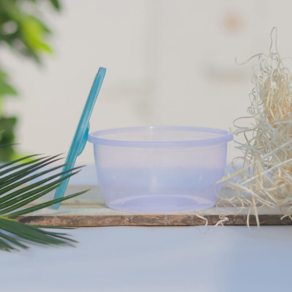 Clear plastic bowl with an open lid