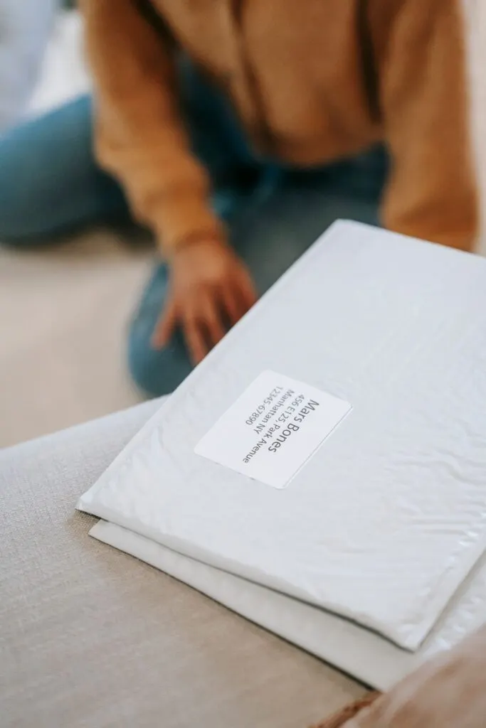 White polymailer parcel with an address label